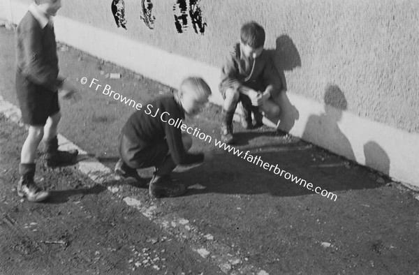 CHILDREN PLAYING IN STREET